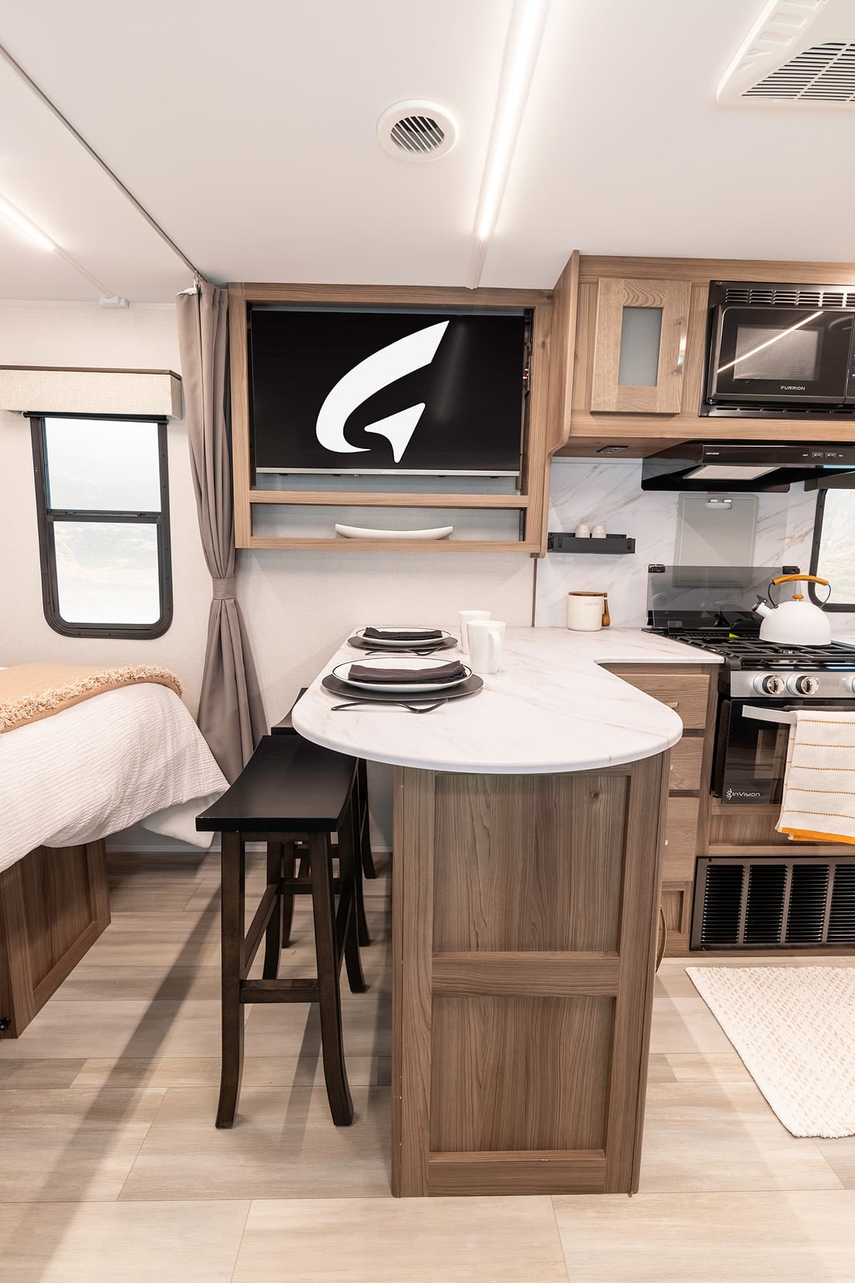 Go Explore X203 - Dining & TV Area